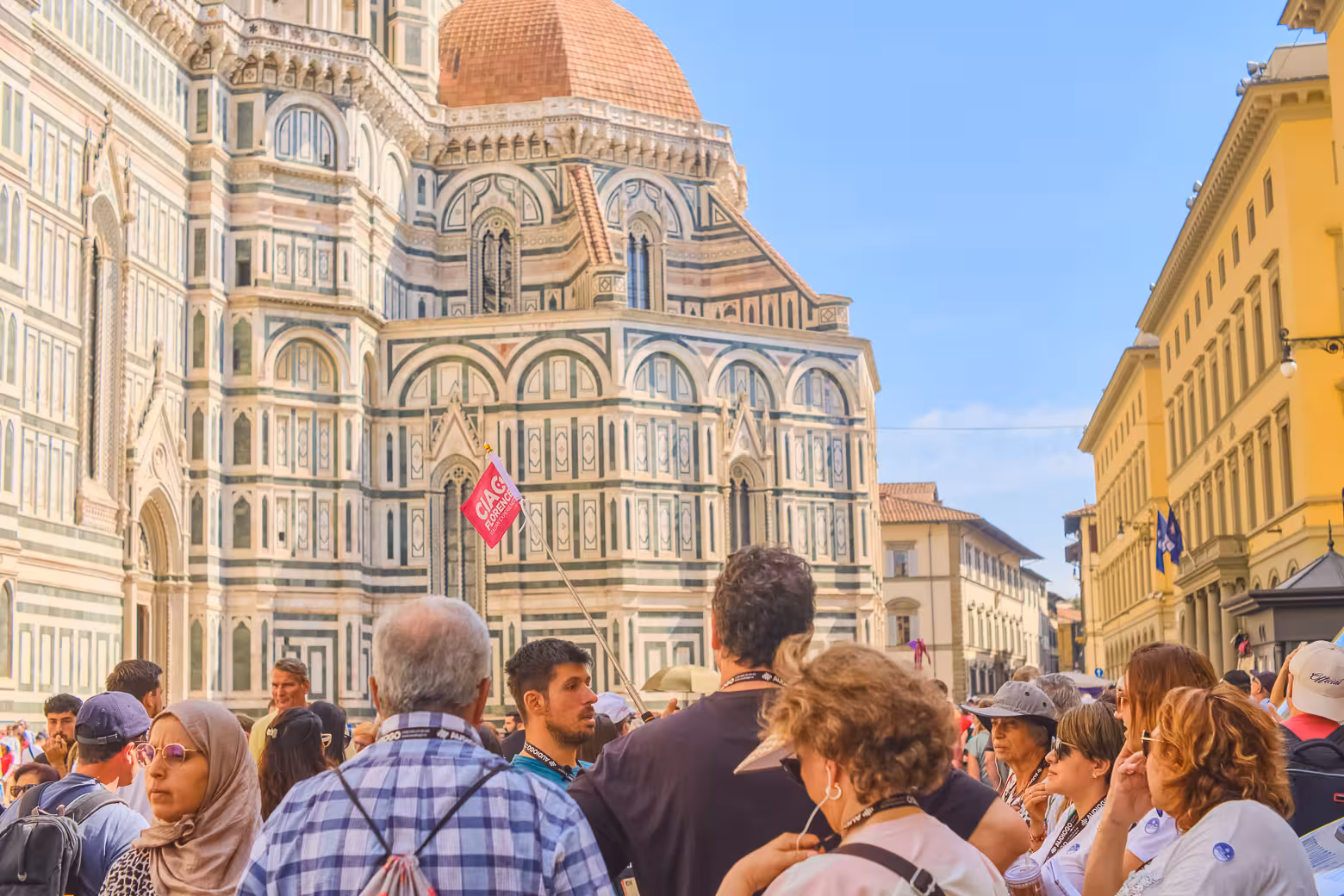 Tourists gather at Florence's iconic Duomo during a full day shore excursion from Livorno with tasting experience.