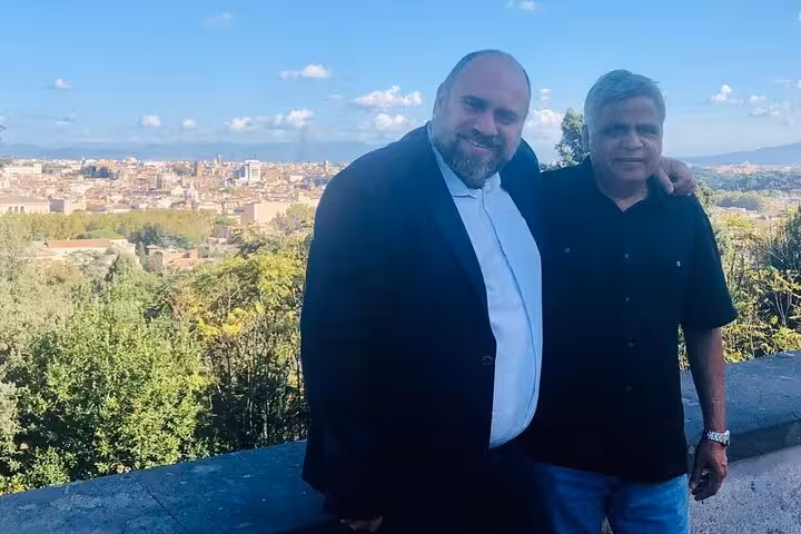 Travelers enjoying panoramic Florence viewpoint on a Rome to Florence day trip sightseeing tour in Tuscany