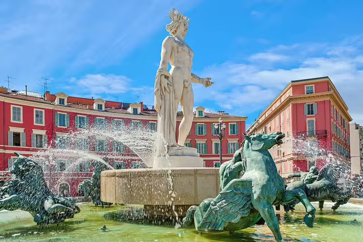 Fontaine du Soleil fountain with Apollo statue and horse sculptures at Place Masséna in Nice, France