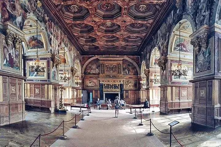 Grand gallery inside Château de Fontainebleau with frescoed walls, featured on a private day tour from Paris