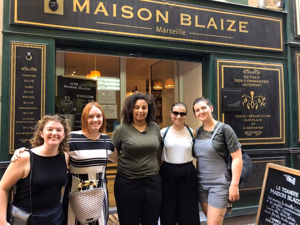 Happy group outside Maison Blaize in Le Panier, Marseille, on a food tour tasting local specialties