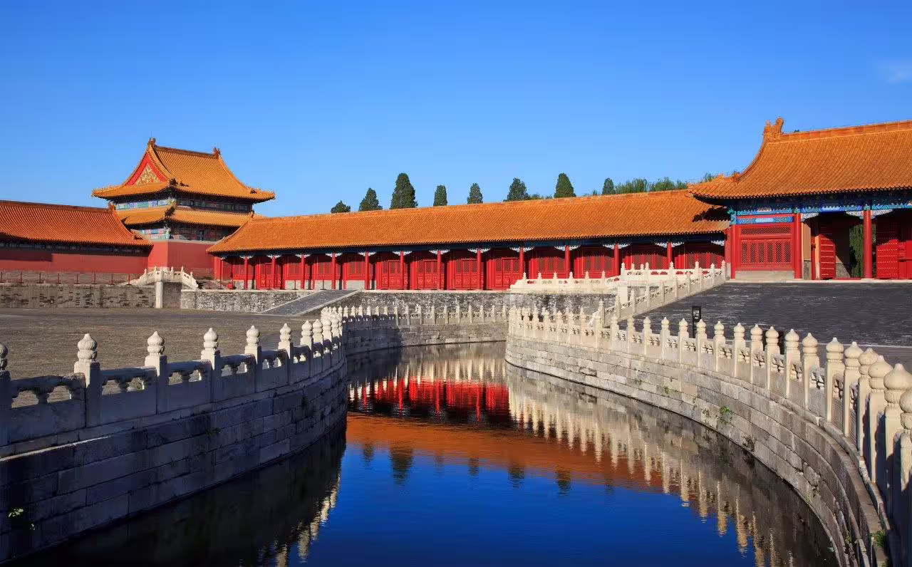 Discover the grandeur of the Forbidden City with its vibrant red walls and serene moat on a private tour.