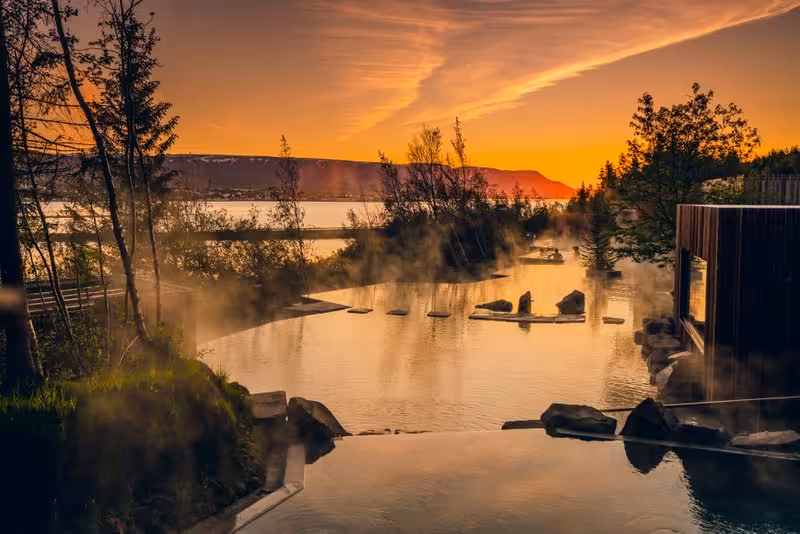 Forest Lagoon geothermal spa at sunset near Akureyri, relaxing soak on Northern Wonders tour from Goðafoss