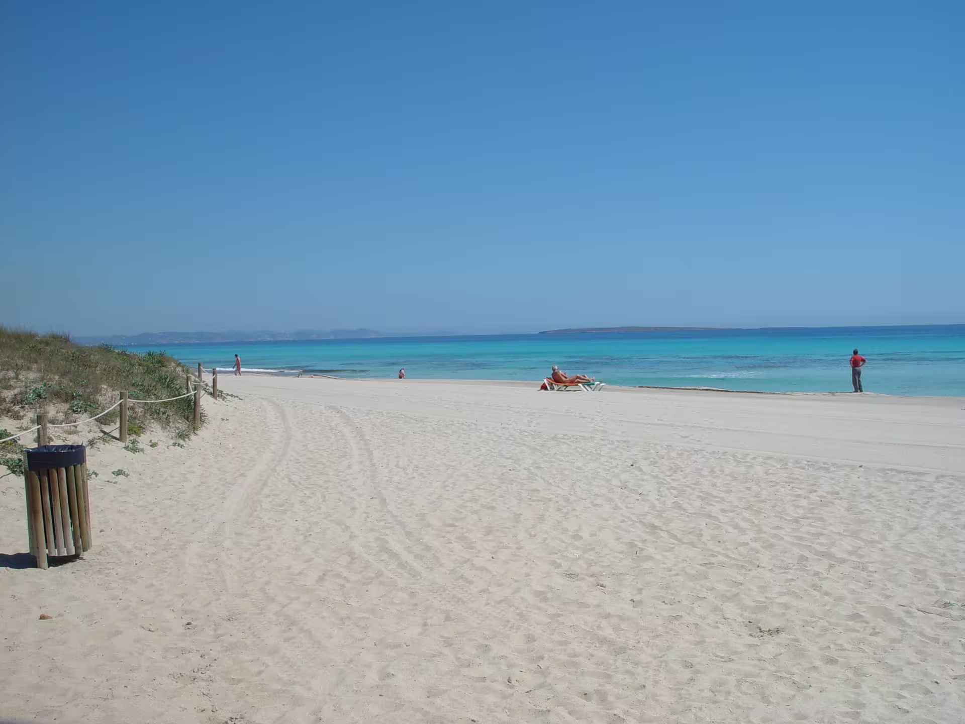 Formentera white-sand beach and turquoise sea on Ibiza day trip with fast ferry, transfers and beach stops