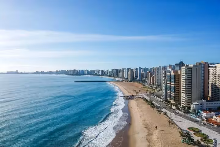 Aerial view of Fortaleza Orla Marítima beachfront skyline, ideal for Fortaleza Airport hotel transfer service