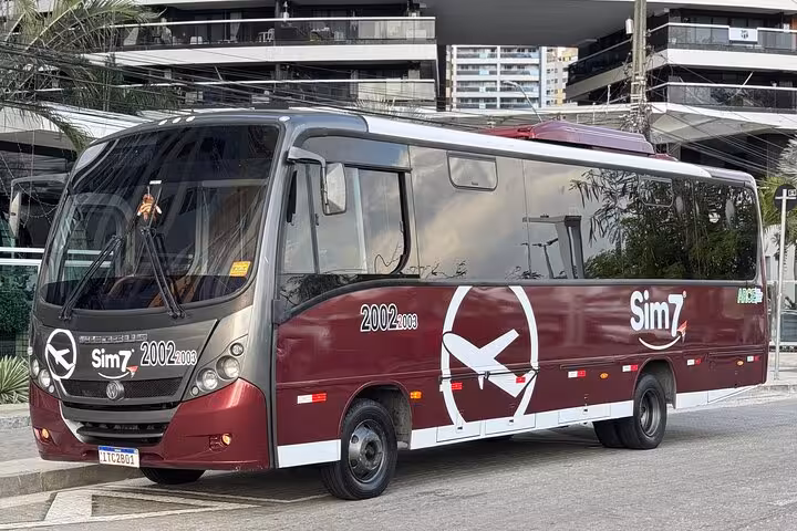 Comfortable shuttle bus for Fortaleza Airport to Orla Marítima beachfront hotels transfer in Ceará, Brazil