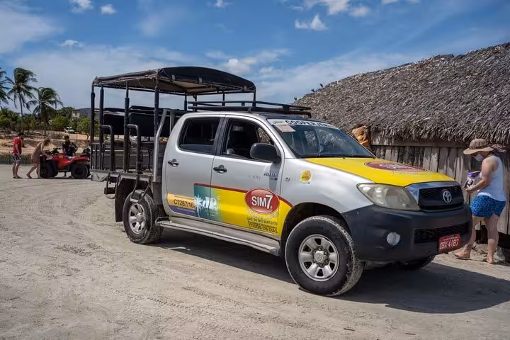 4x4 pickup transfer from Fortaleza to Jericoacoara on sandy road, shared shuttle to Jeri village