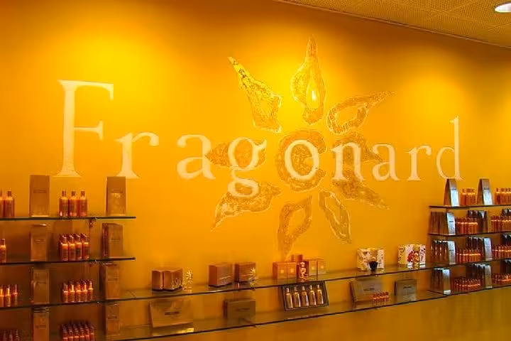Fragonard perfume shop interior with golden walls displaying fragrance products in Eze, France