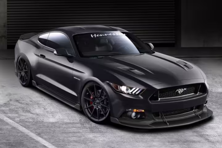 Matte black Ford Mustang GT premium sports car by Hennessey, side front view