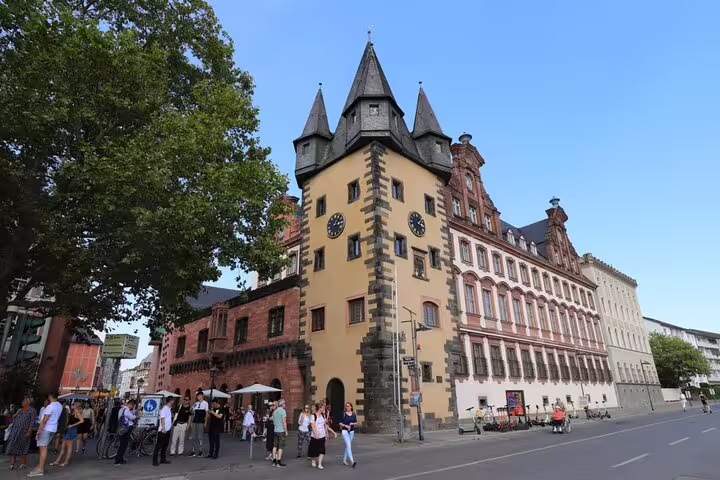 Historic Frankfurt Old Town tower with clock and Gothic architecture on a sunny day