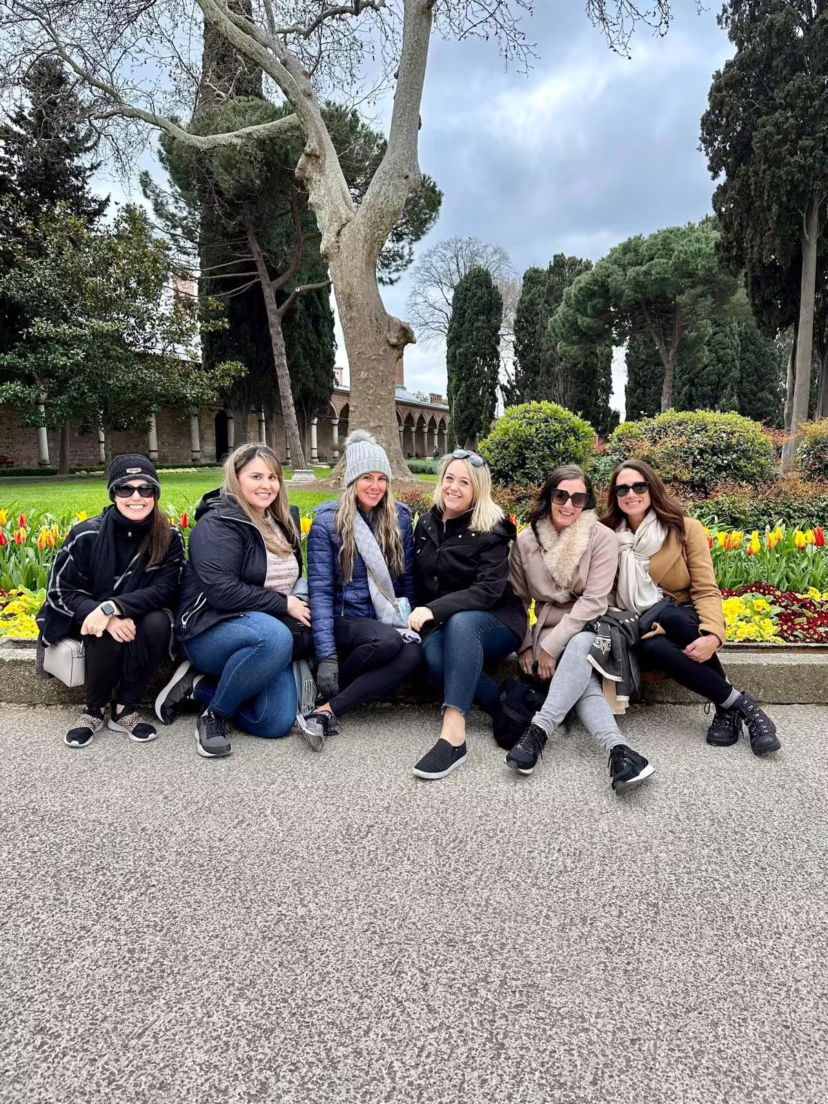 Friends relaxing in Sultanahmet Park gardens, Istanbul, on the Ephesus & Istanbul combined 2 tours itinerary