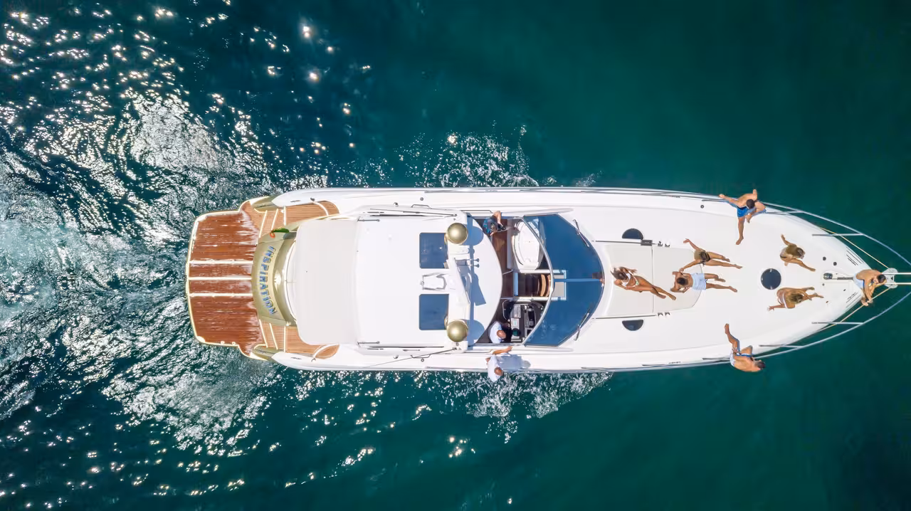 Aerial view of guests sunbathing on a luxury yacht during Full Day Cruise Gold 10-hour Algarve experience