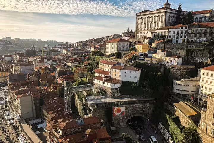 Scenic view of historic Porto with colorful buildings and iconic architecture, perfect for a full-day private tuk-tuk tour.