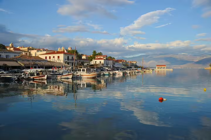 Galaxidi harbor with fishing boats and waterfront houses, scenic stop on Delphi Itea Galaxidi private tour