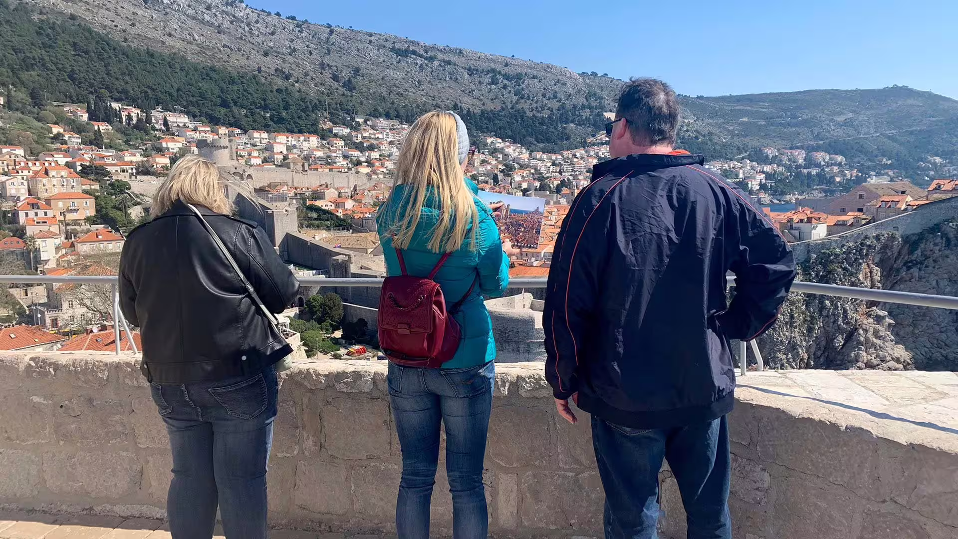 Guests admire Dubrovnik Old Town views on a Game of Thrones shore excursion, overlooking King’s Landing walls