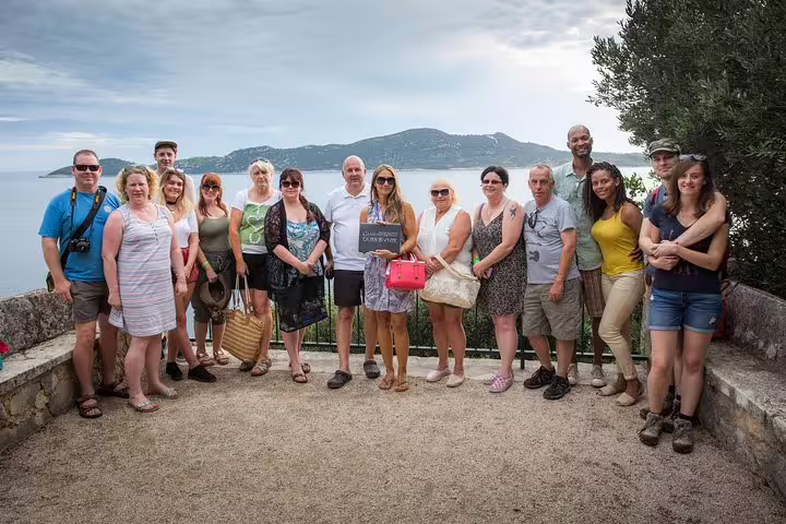 Group photo at a Dubrovnik viewpoint on the Total Game of Thrones Experience tour with Adriatic backdrop