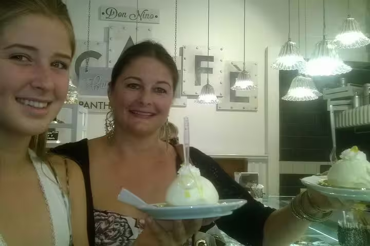 Two women savoring gelato at Don Nino Café near the Pantheon on a Rome dessert guided tour