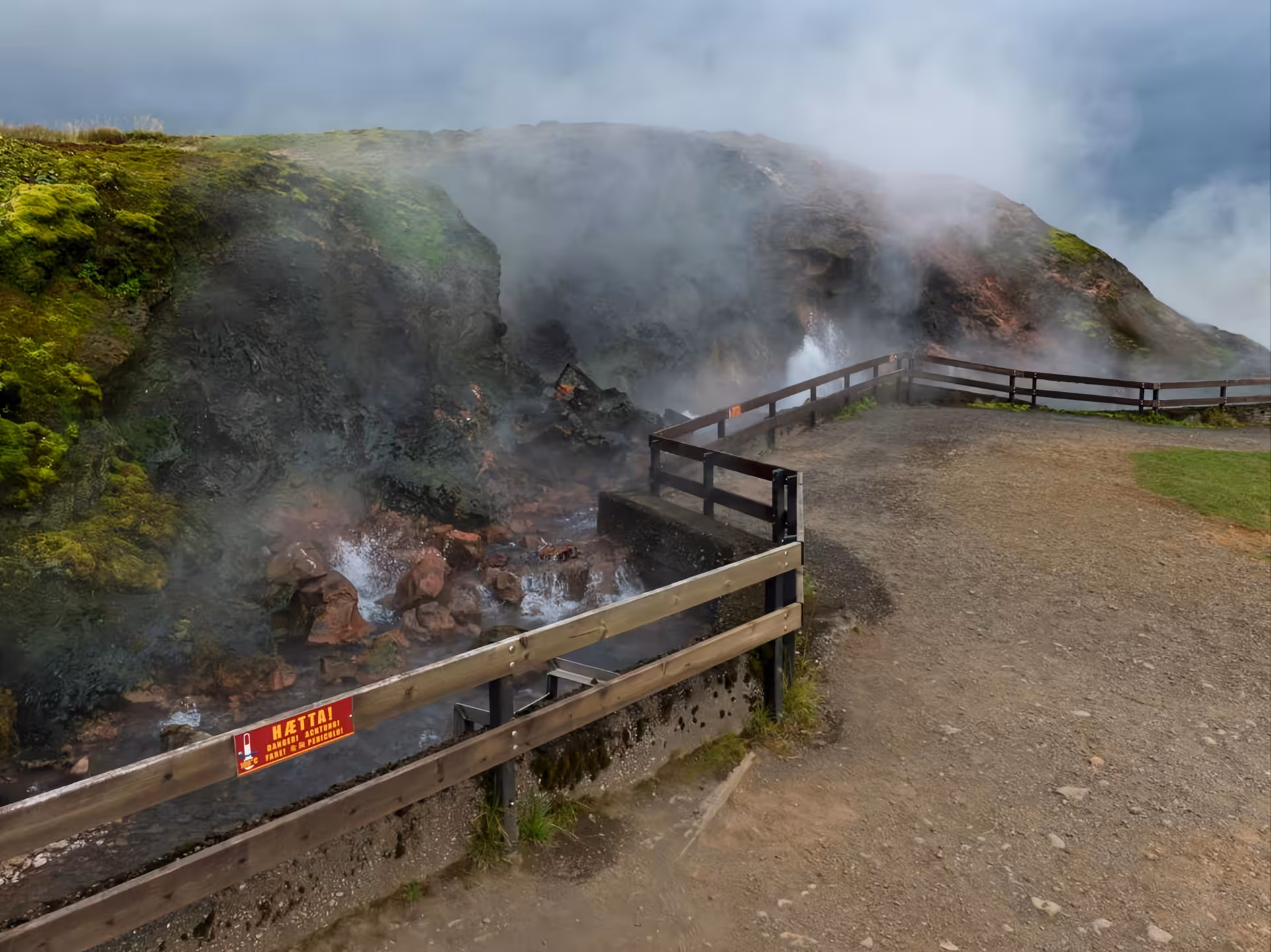 Steaming geothermal hot spring area with boardwalk stop on Silver Circle day trip from Reykjavik, Iceland