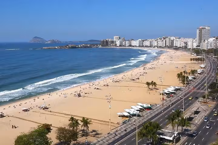 Stunning view of Copacabana Beach in Rio de Janeiro, a must-see destination on your exclusive shuttle tour.
