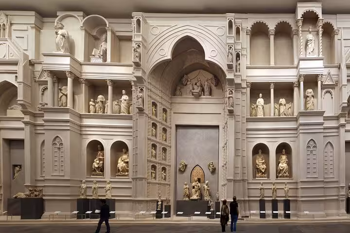 Ornate sculptures and architectural details inside Florence's Giotto Bell Tower and Cathedral, showcasing Renaissance artistry.