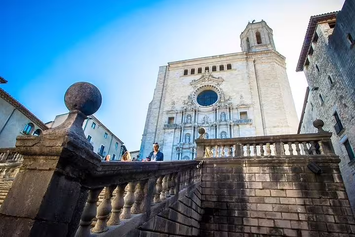 The majestic facade of Girona Cathedral, showcasing stunning architecture on the Girona City Tour.