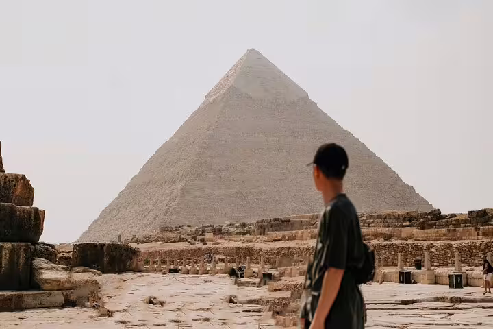Traveler viewing the Great Pyramid of Giza on a private shore excursion from El-Sokhna Port, Egypt