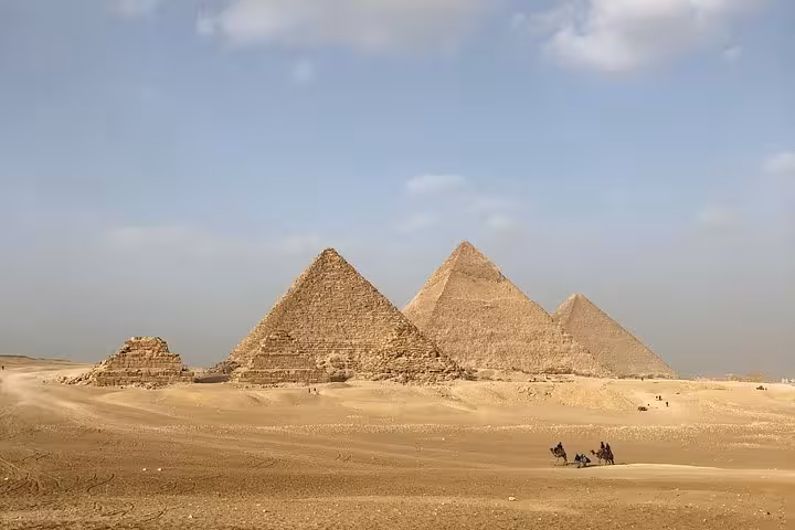 Panoramic view of the Giza Pyramids desert on a private all-inclusive trip from Cairo Airport