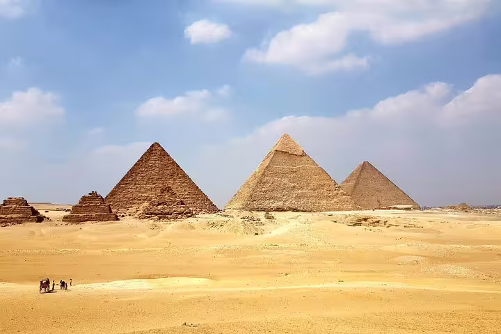 Panoramic view of Giza Pyramids in Cairo desert, highlight of 12 day Egypt tour to Luxor, Aswan and Hurghada