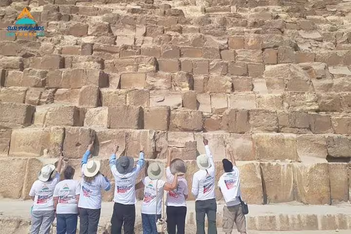 Group tour at Giza Pyramid limestone blocks, full-day Cairo trip including Memphis, Dahshur, Saqqara, El-Moez and Cairo Tower