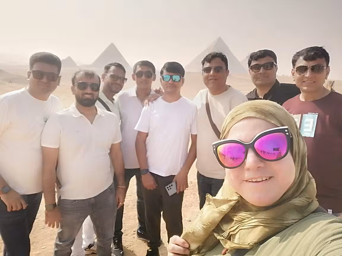 Group photo at Giza Pyramids, Cairo desert viewpoint on camel ride and lunch tour with local guide