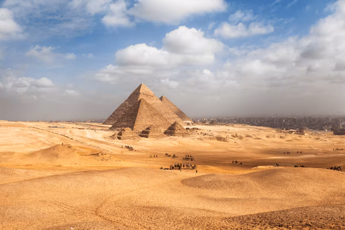 Panoramic view of the Giza Pyramids near Cairo, iconic stop on an 8-day Nile cruise through ancient Egypt