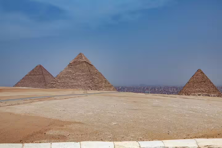 Panoramic view of the Giza Pyramids plateau near Cairo, iconic stop on a full-day guided tour