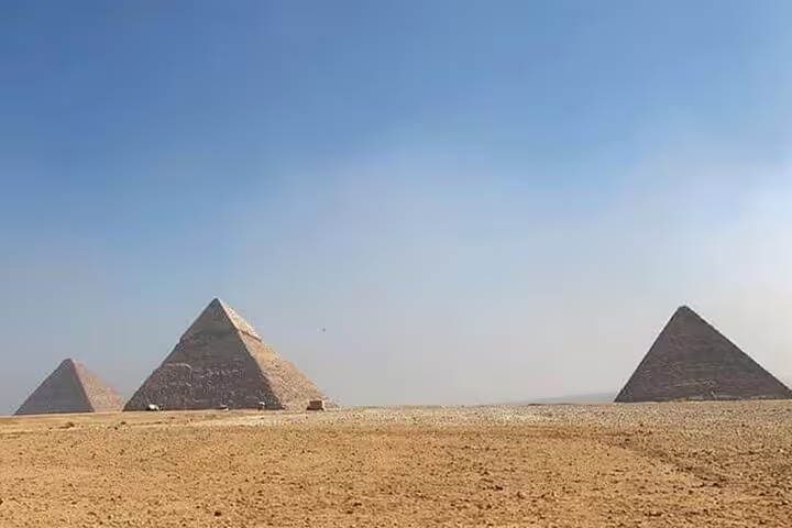 Panoramic view of the Giza Pyramids in Egypt desert on private tour with NEMC and Egyptian Museum highlights