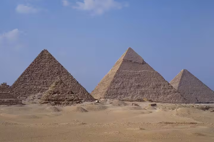 Panoramic view of the Giza Pyramids in Cairo desert, highlight of private Giza Pyramids and Museum tour