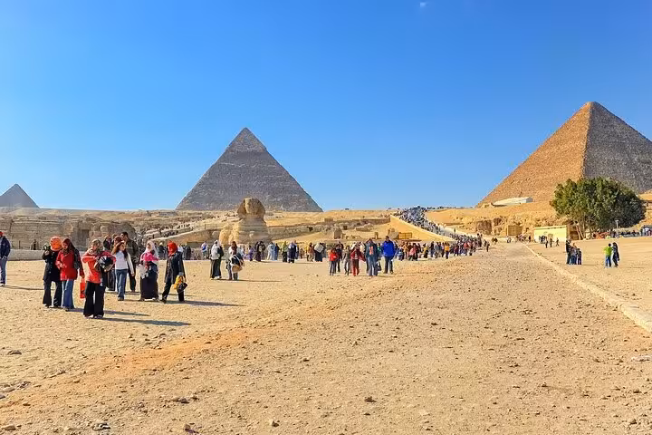 Crowds at the Giza Plateau with the Sphinx and pyramids, skip-the-line entry ticket for fast site access