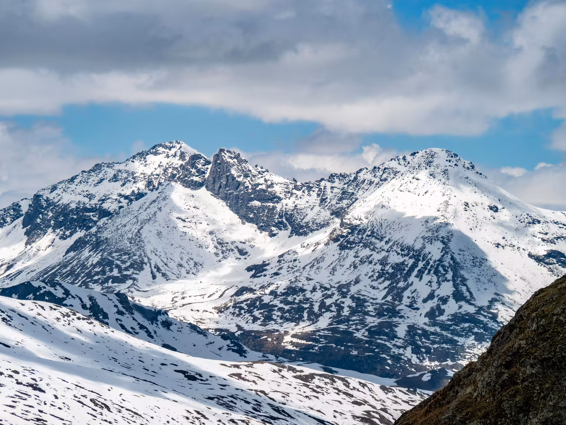 Dramatic snow-capped Swiss Alps panorama seen along the Glacier Express route on a private tour from Zurich
