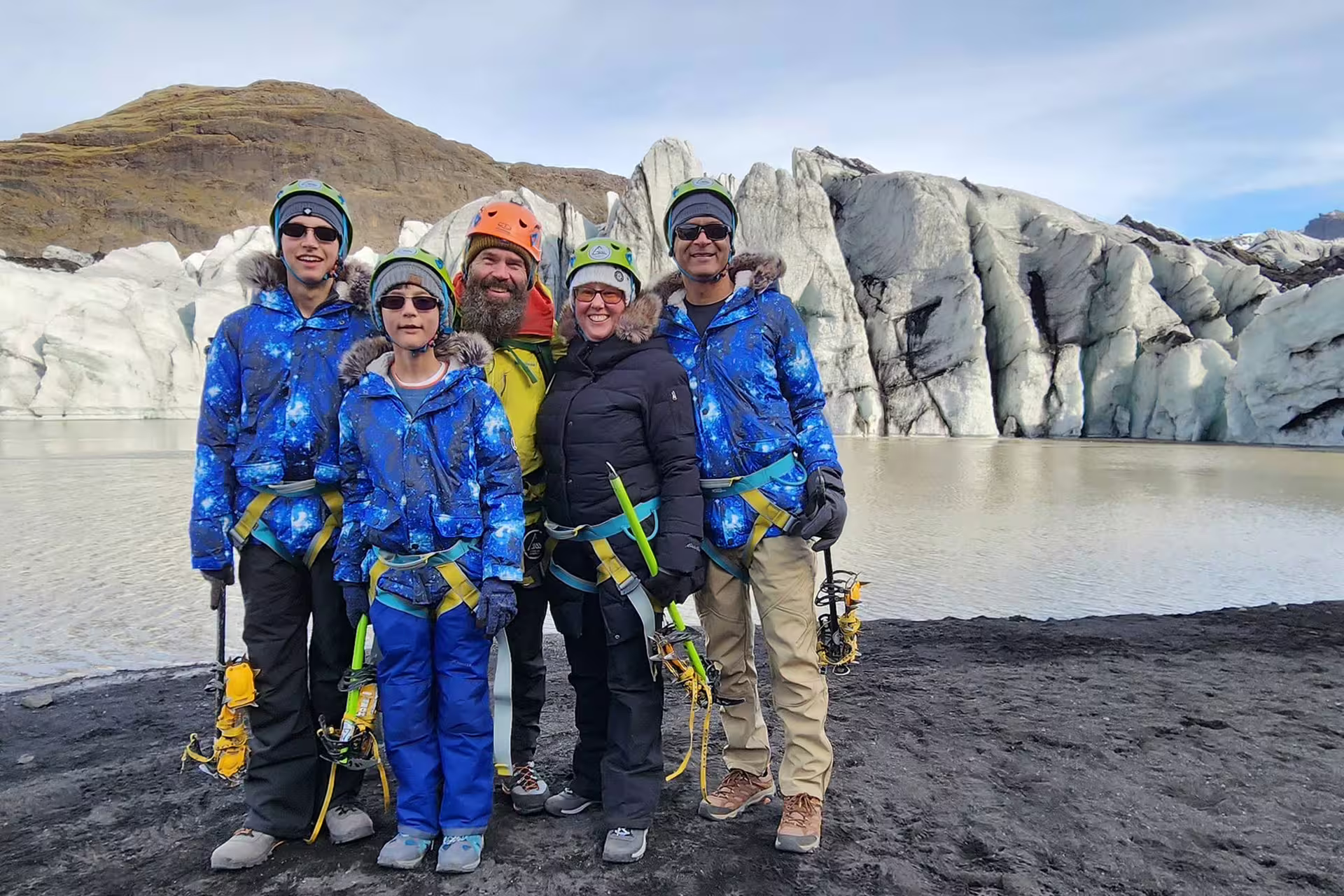 Standing in front of the glacier outlet.