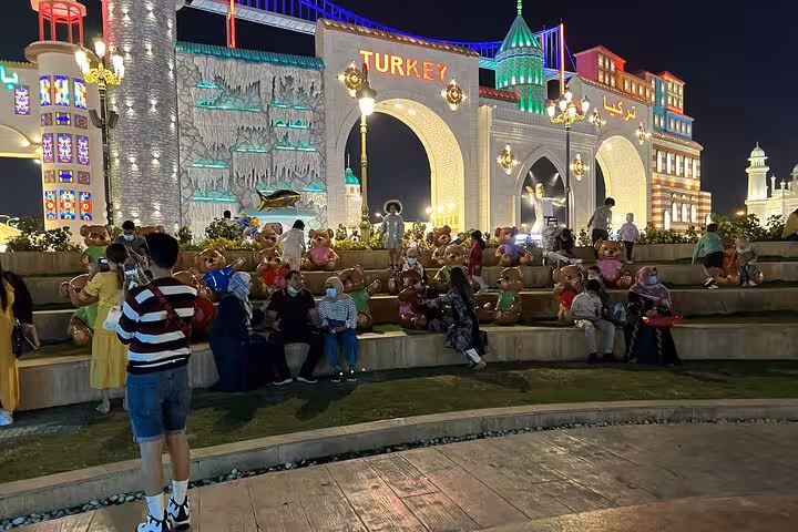 Global Village Turkey pavilion at night with crowds and lights, Ras AlKhaimah Ticket Pass Adventure Await