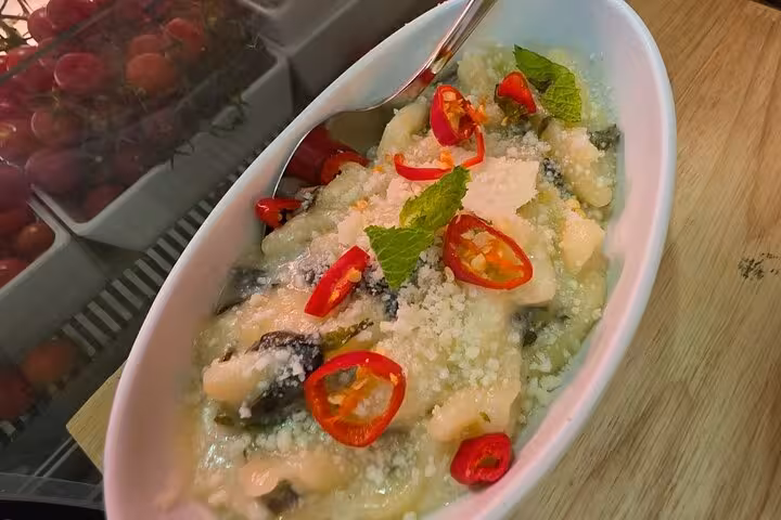 Enjoy gluten-free gnocchi with red chili and mint at Chef Christian's Roman Feast Cooking Class.