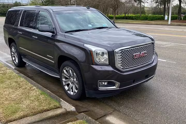 Luxury GMC Denali SUV for private transfer from Belize to Belize Airport BZE comfortable ride