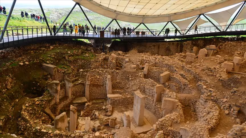Göbeklitepe archaeological site with T-shaped pillars and visitor walkway, highlight of 2-day Şanlıurfa tour