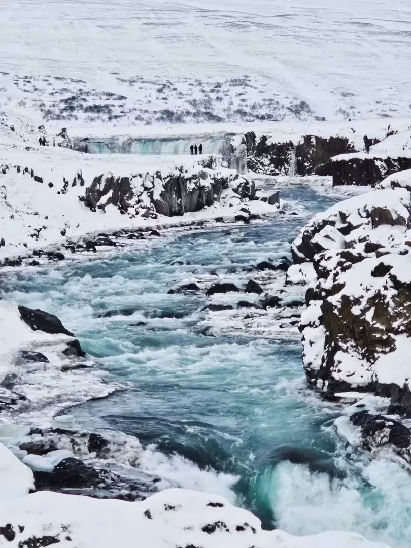 Icy river canyon near Goðafoss Waterfall, North Iceland private winter tour with sacred Christmas dreams experience