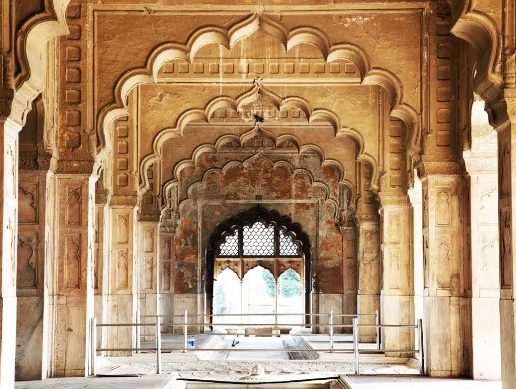 Marvel at the intricate Mughal architecture of Delhi's Red Fort, a highlight in the Golden Triangle with Amritsar package.