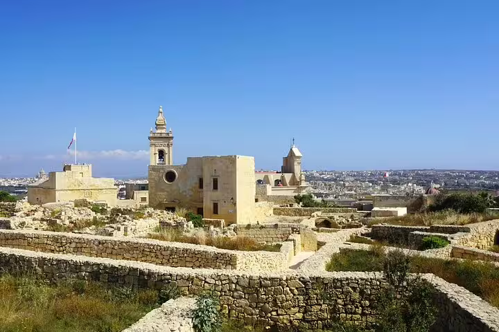 Panoramic view of Gozo Citadel ruins and bell tower on a small group UNESCO temples guided tour