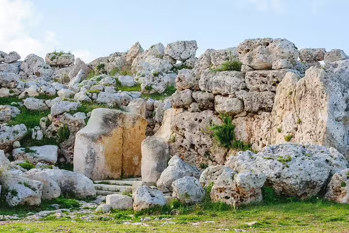 Ancient UNESCO megalithic temple ruins in Gozo Malta with massive limestone boulders on a guided small group tour