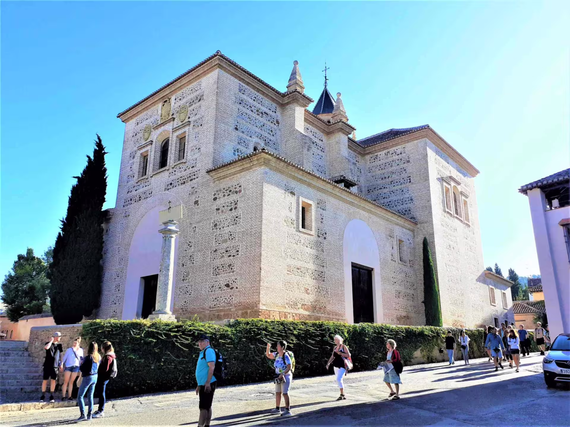 Tour group outside Granada Alhambra complex on Costa del Sol pick-up excursion with guided visit