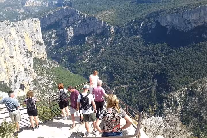 Visitors enjoying panoramic vistas of the Grand Canyon of Europe from a popular observation deck.