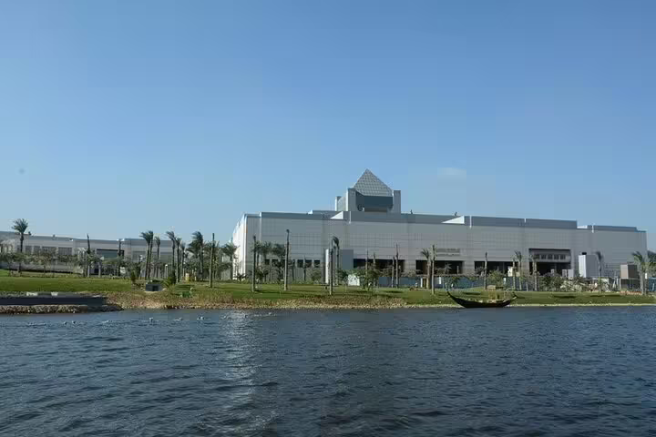 Exterior of the Grand Egyptian Museum in Cairo by the water, featured on Egyptian Museum and Citadel tour