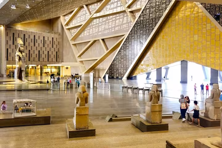 Grand Egyptian Museum Cairo interior with pharaoh statues, ideal for Giza pyramids and Tutankhamun tour
