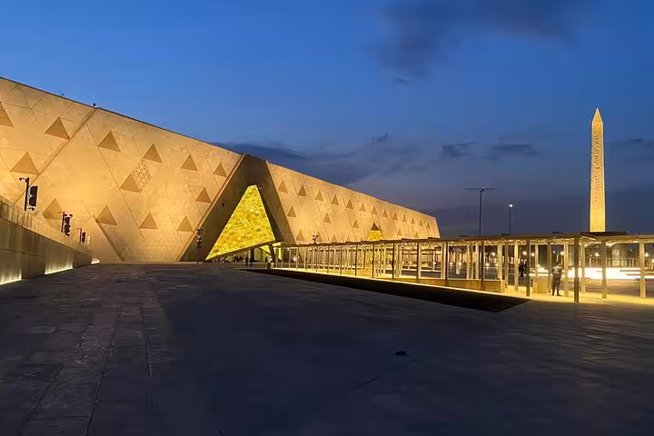 Night view of the Grand Egyptian Museum Giza, a key stop on Cairo highlights tour with pyramids and museum